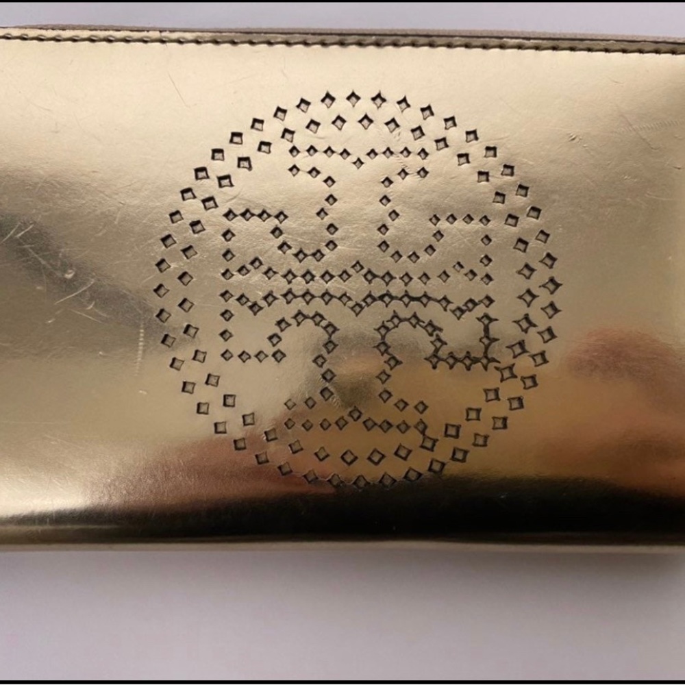 Tory Burch gold wallet in good used condition